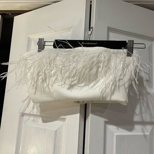 Shop impressions boutique feather crop top